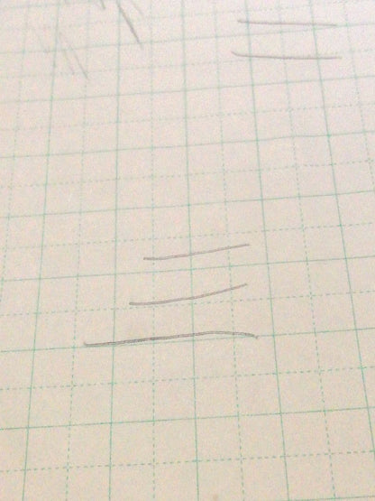 CROSS slim ballpoint pen in chic wine red color writing on paper