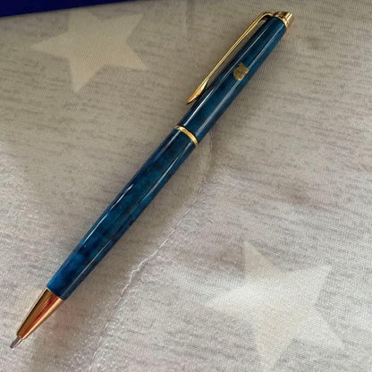 WATERMAN blue ballpoint pen displayed with its dedicated case on a white background