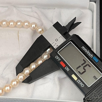 Tasaki Akoya pearl necklace with 7.3 to 7.5mm white pearls and silver S clasp, 41cm long