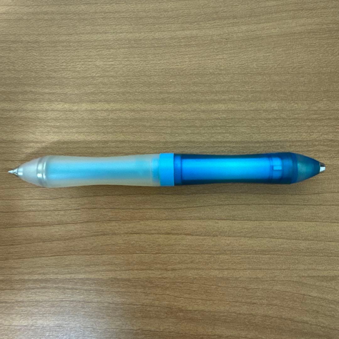 Discontinued PILOT Symmetry 0.5 pen with faded grip and partially worn logo shown in close-up