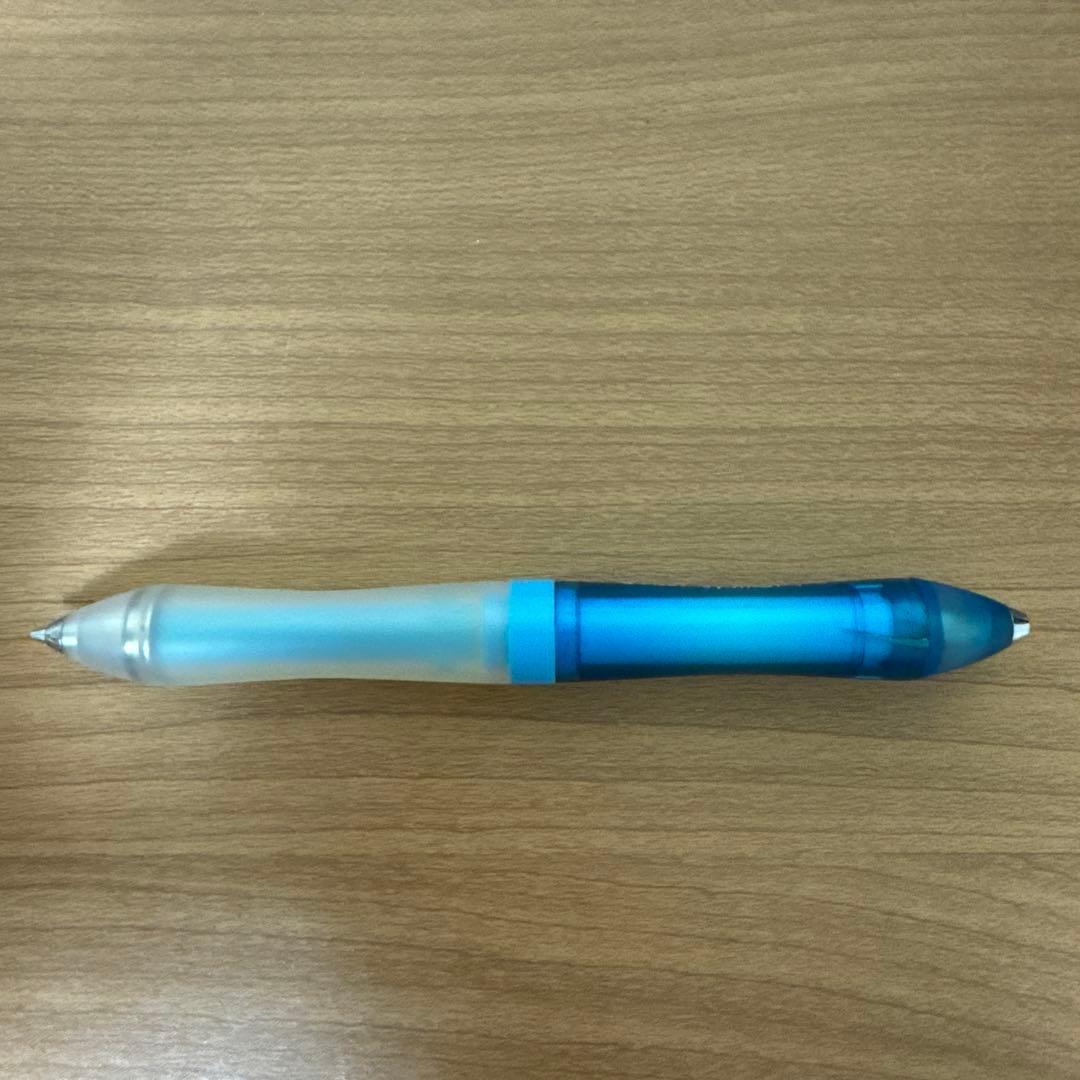 Discontinued PILOT Symmetry 0.5 pen with faded grip and partially worn logo shown in close-up