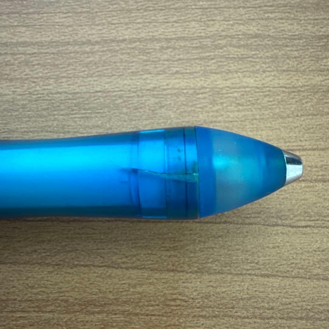 Discontinued PILOT Symmetry 0.5 pen with faded grip and partially worn logo shown in close-up