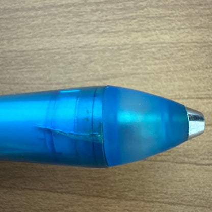 Discontinued PILOT Symmetry 0.5 pen with faded grip and partially worn logo shown in close-up