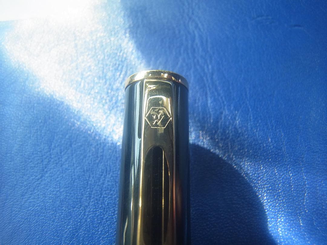 Black WATERMAN fountain pen with sleek design shown on neutral background