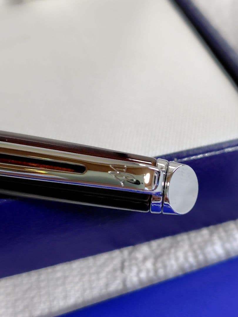 WATERMAN Metropolitan Series ballpoint pen in maroon metallic with silver metallic clip on white background