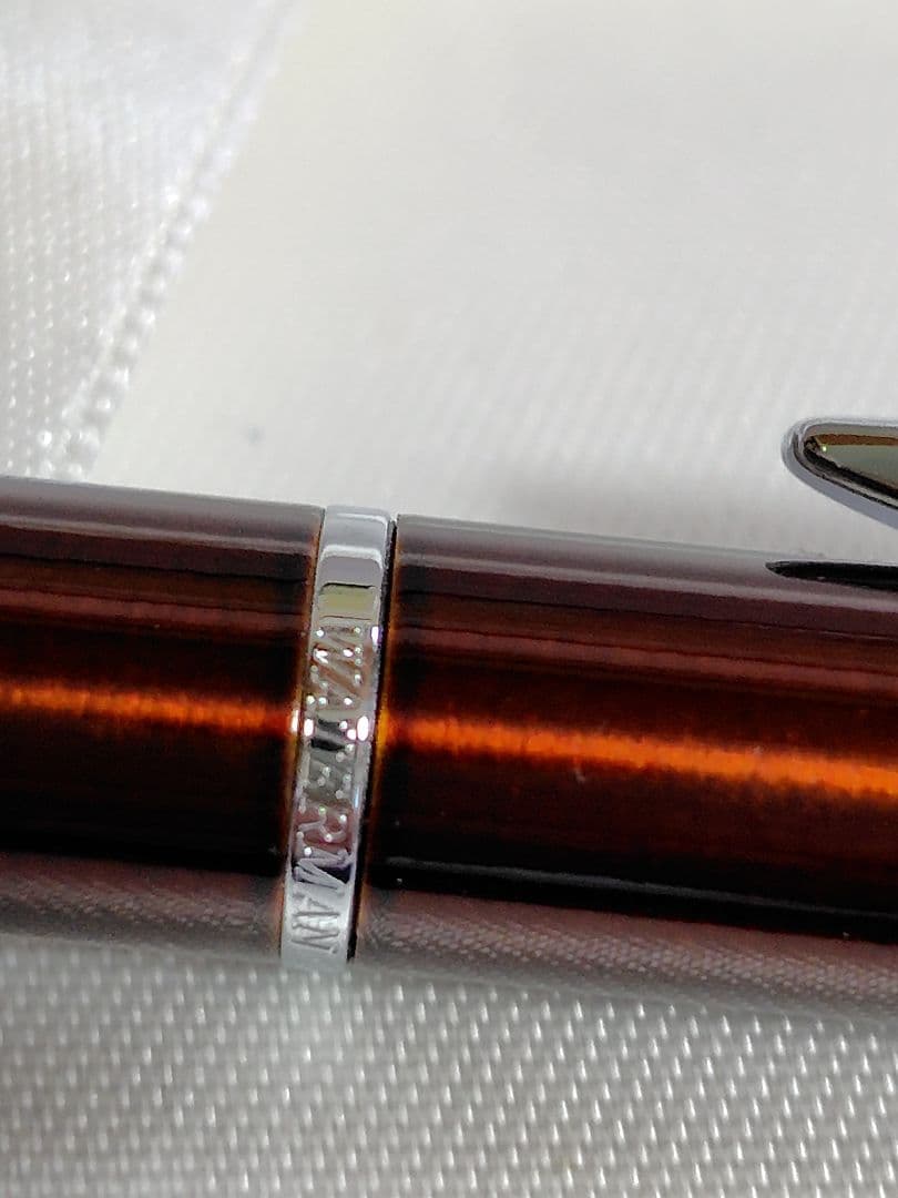WATERMAN Metropolitan Series ballpoint pen in maroon metallic with silver metallic clip on white background