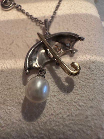 MIKIMOTO umbrella motif pearl necklace made of silver and K18 with pearls, displayed with included case