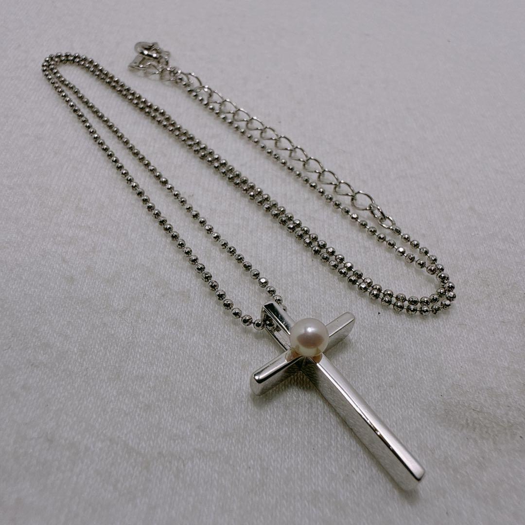 TASAKI silver necklace featuring a single pearl and cross motif with adjustable 39-45 cm chain