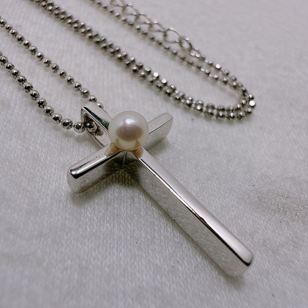 TASAKI silver necklace featuring a single pearl and cross motif with adjustable 39-45 cm chain