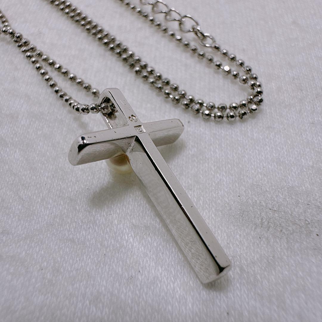 TASAKI silver necklace featuring a single pearl and cross motif with adjustable 39-45 cm chain