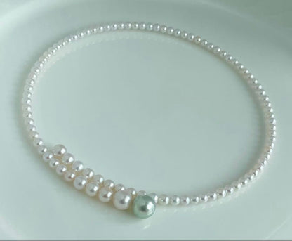 Multicolor Akoya pearl necklace with 4.0-9.3 mm pearls in omega style choker design