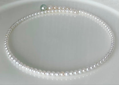 Multicolor Akoya pearl necklace with 4.0-9.3 mm pearls in omega style choker design