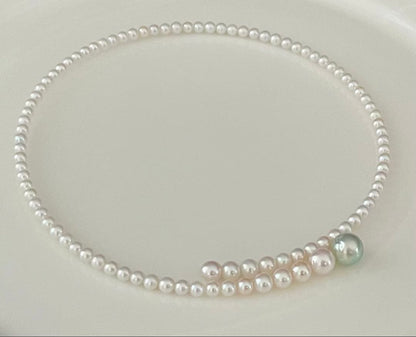 Multicolor Akoya pearl necklace with 4.0-9.3 mm pearls in omega style choker design