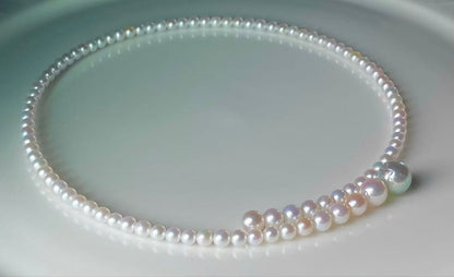Multicolor Akoya pearl necklace with 4.0-9.3 mm pearls in omega style choker design