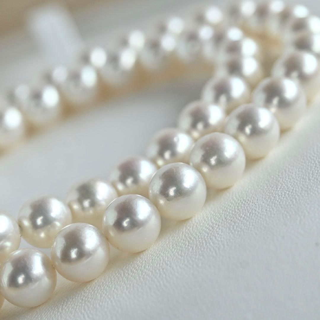 Highest Grade Hanadama Aquamarine Pearl Necklace with 8mm round pearls and silver clasp in cream white with aurora mix color