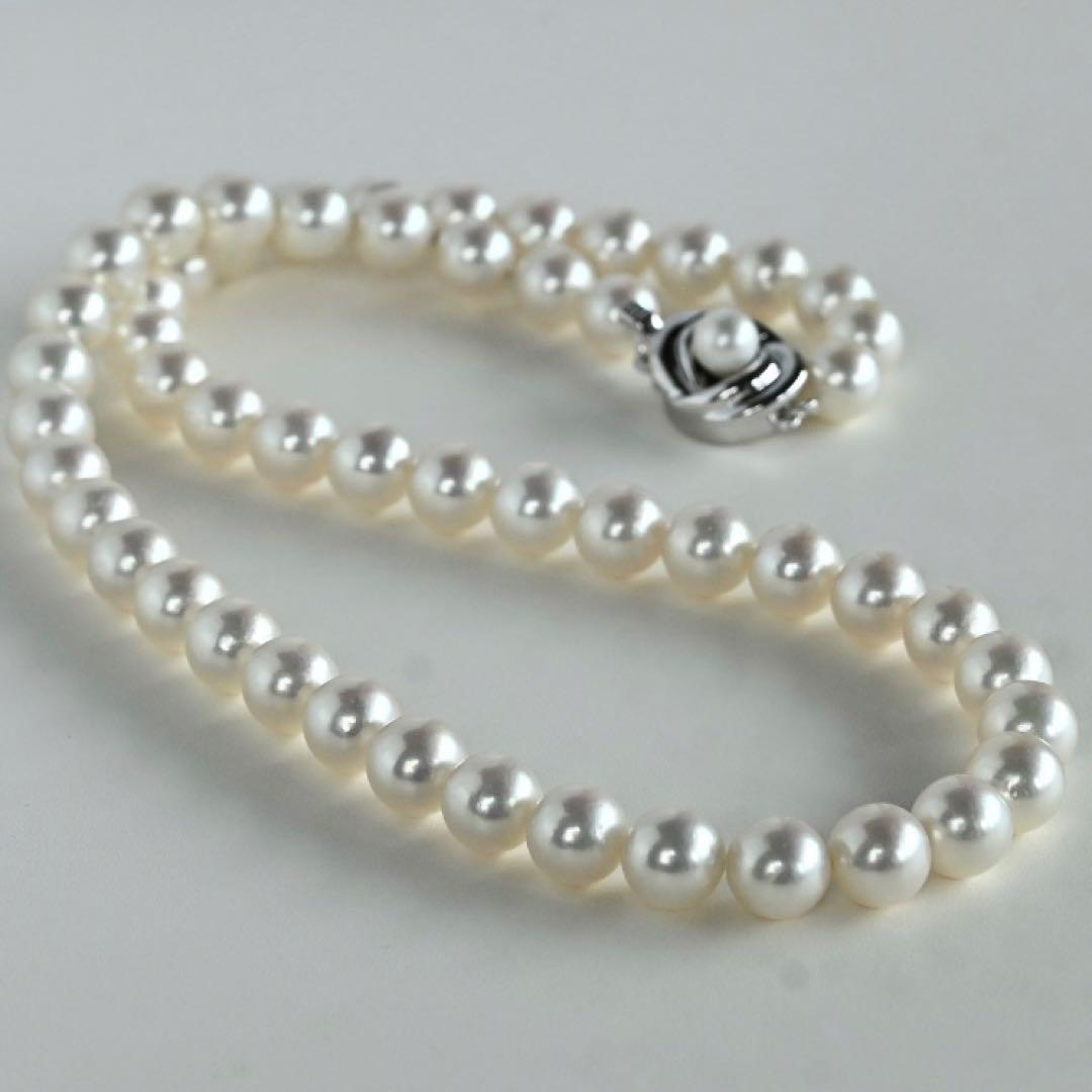 Highest Grade Hanadama Aquamarine Pearl Necklace with 8mm round pearls and silver clasp in cream white with aurora mix color