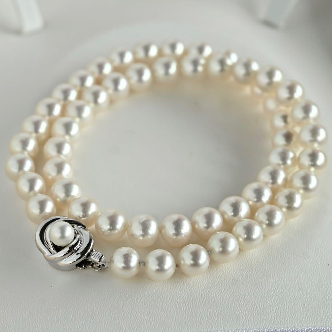 Highest Grade Hanadama Aquamarine Pearl Necklace with 8mm round pearls and silver clasp in cream white with aurora mix color