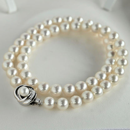 Highest Grade Hanadama Aquamarine Pearl Necklace with 8mm round pearls and silver clasp in cream white with aurora mix color