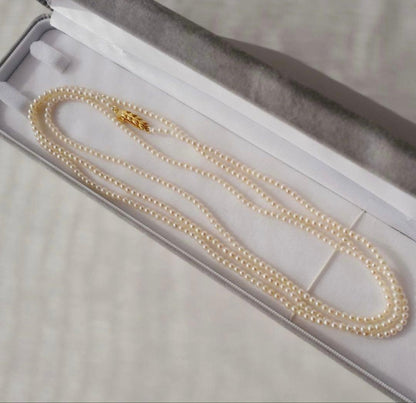 Freshwater Akoya baby pearl necklace 112cm long with small ivory tone pearls and gold plated fittings