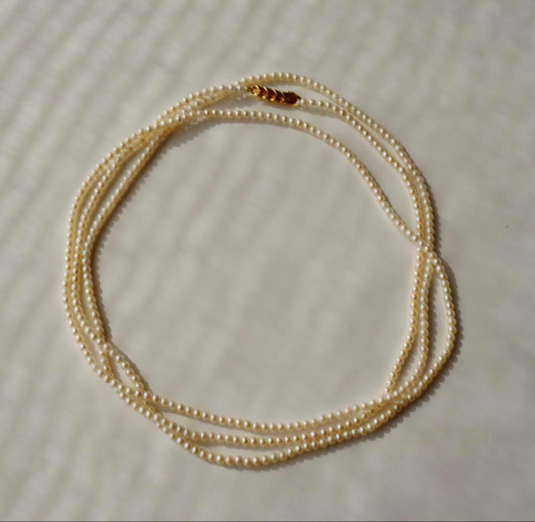 Freshwater Akoya baby pearl necklace 112cm long with small ivory tone pearls and gold plated fittings