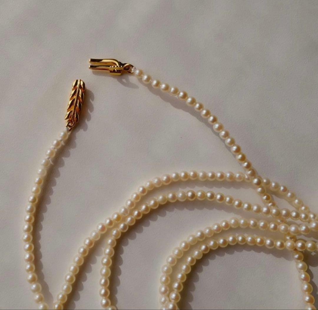 Freshwater Akoya baby pearl necklace 112cm long with small ivory tone pearls and gold plated fittings