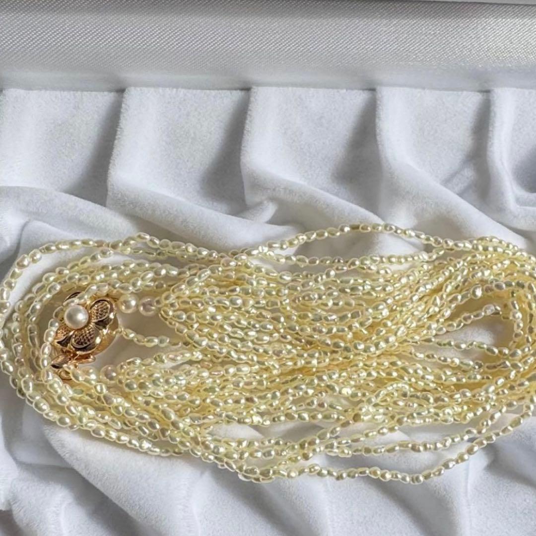 K14 Akoya pearl mugwartless bead necklace with 8 strands and K14 pink gold clasp, 43 cm length