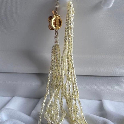 K14 Akoya pearl mugwartless bead necklace with 8 strands and K14 pink gold clasp, 43 cm length