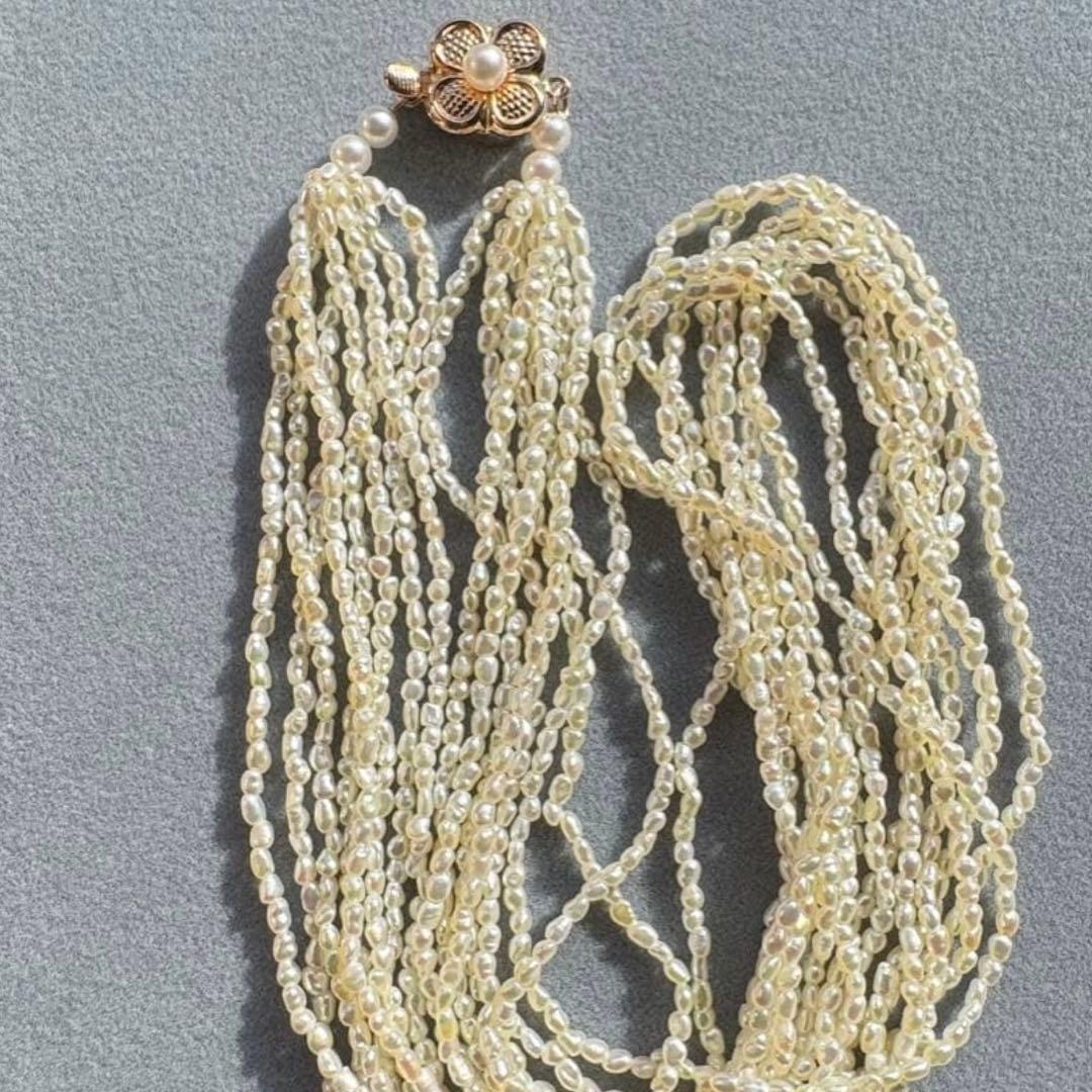 K14 Akoya pearl mugwartless bead necklace with 8 strands and K14 pink gold clasp, 43 cm length