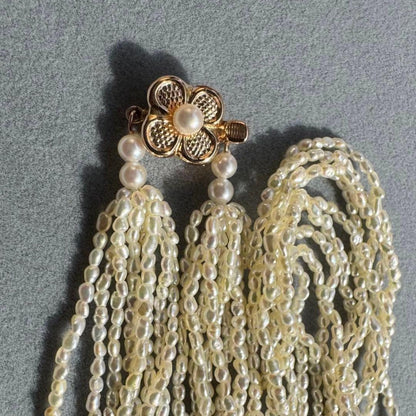 K14 Akoya pearl mugwartless bead necklace with 8 strands and K14 pink gold clasp, 43 cm length