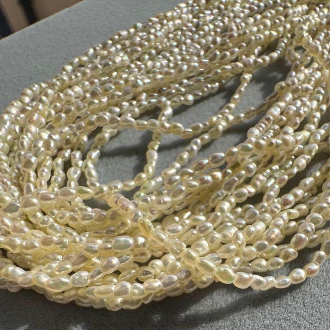 K14 Akoya pearl mugwartless bead necklace with 8 strands and K14 pink gold clasp, 43 cm length