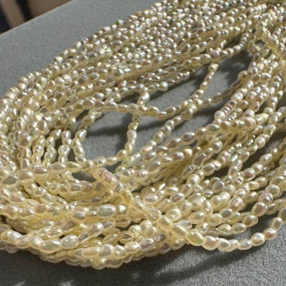 K14 Akoya pearl mugwartless bead necklace with 8 strands and K14 pink gold clasp, 43 cm length