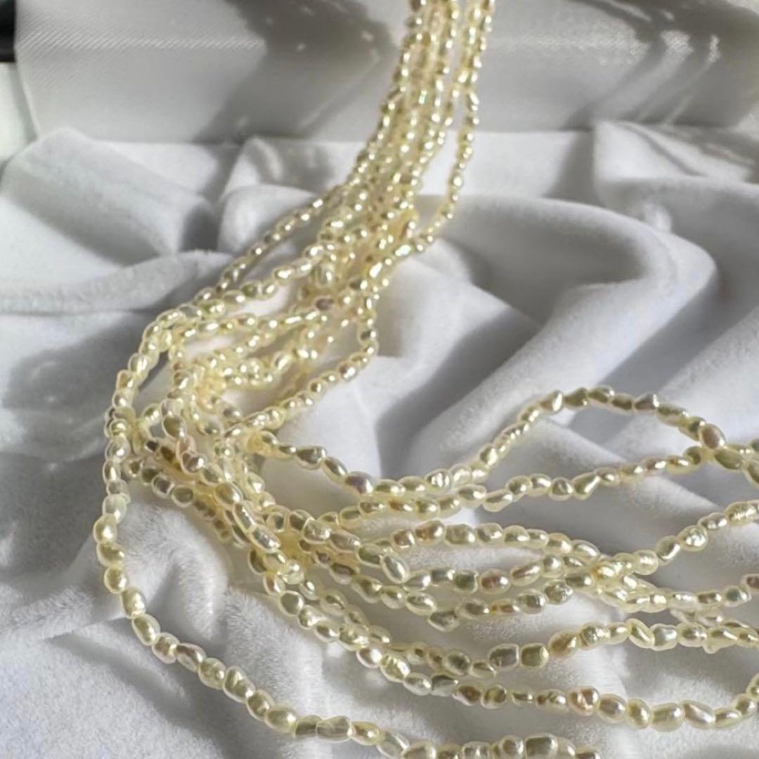 K14 Akoya pearl mugwartless bead necklace with 8 strands and K14 pink gold clasp, 43 cm length