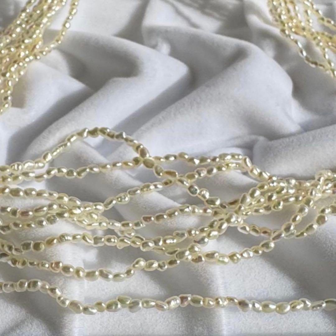 K14 Akoya pearl mugwartless bead necklace with 8 strands and K14 pink gold clasp, 43 cm length