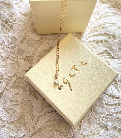 Agate two diamonds necklace made of 18 karat gold with two diamonds totaling 0.15 carats