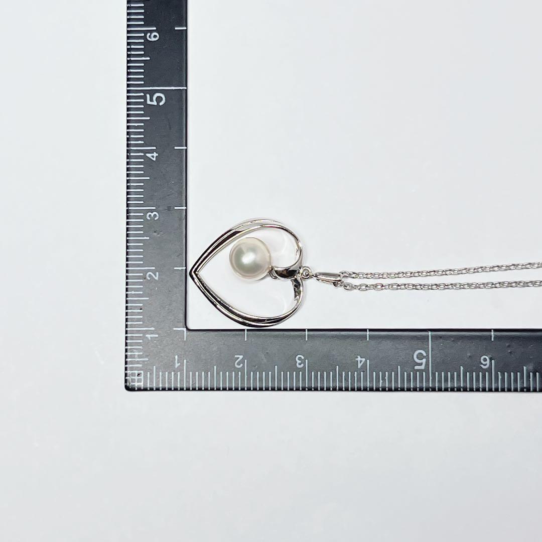 Mikimoto pearl necklace with heart motif featuring 7.1mm pearls on silver chain at 40cm length