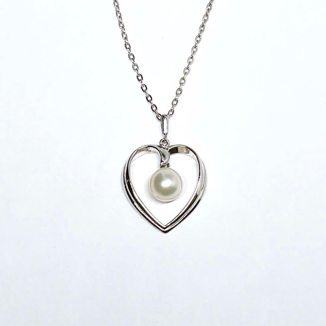 Mikimoto pearl necklace with heart motif featuring 7.1mm pearls on silver chain at 40cm length