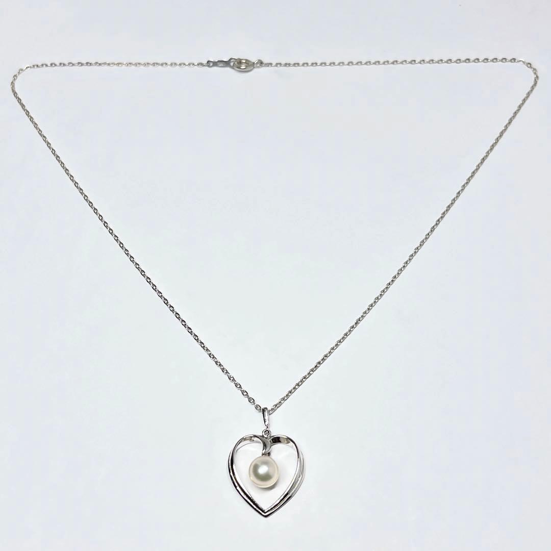 Mikimoto pearl necklace with heart motif featuring 7.1mm pearls on silver chain at 40cm length