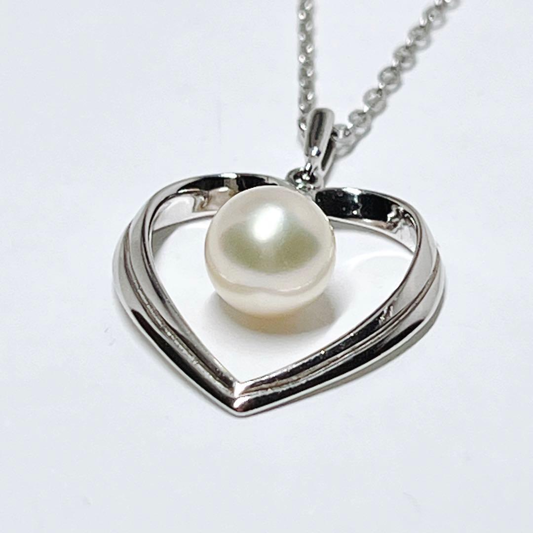 Mikimoto pearl necklace with heart motif featuring 7.1mm pearls on silver chain at 40cm length