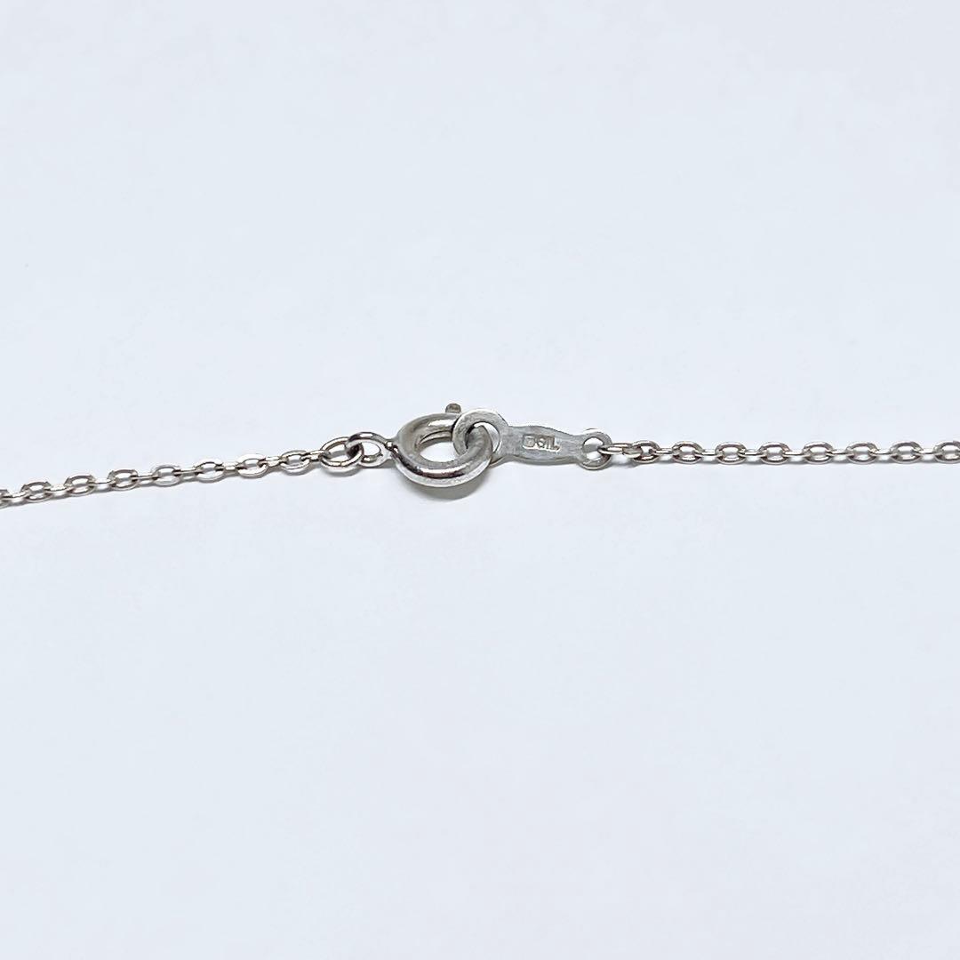 Mikimoto pearl necklace with heart motif featuring 7.1mm pearls on silver chain at 40cm length