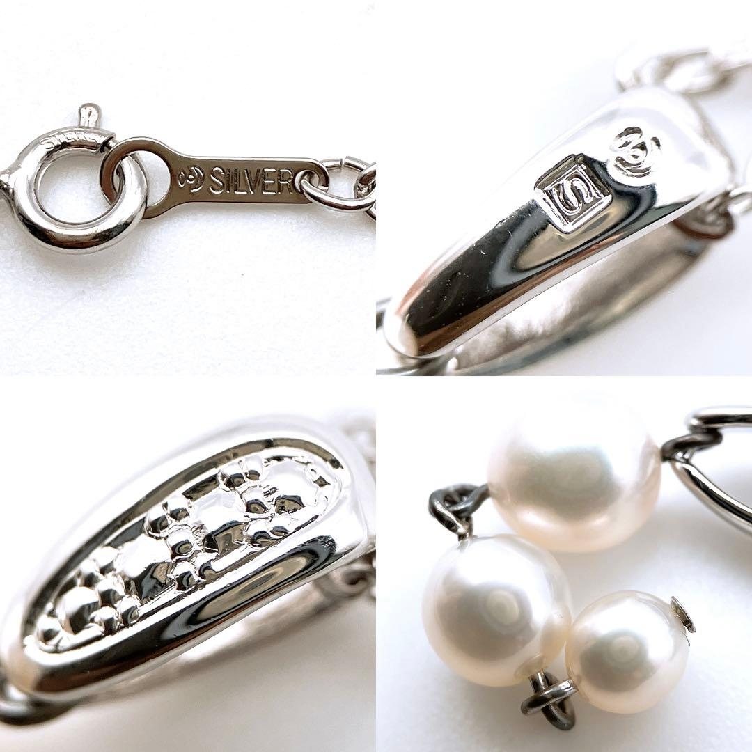 Tasaki Trilogy Necklace in Silver 925 with three white pearls of varying sizes on silver chain