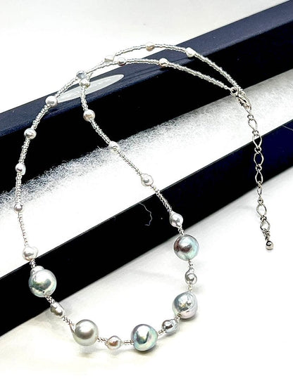 Akoya pearl necklace with 8-10 mm pearls, small baby pearls, Italian gold foil, and Venetian glass parts