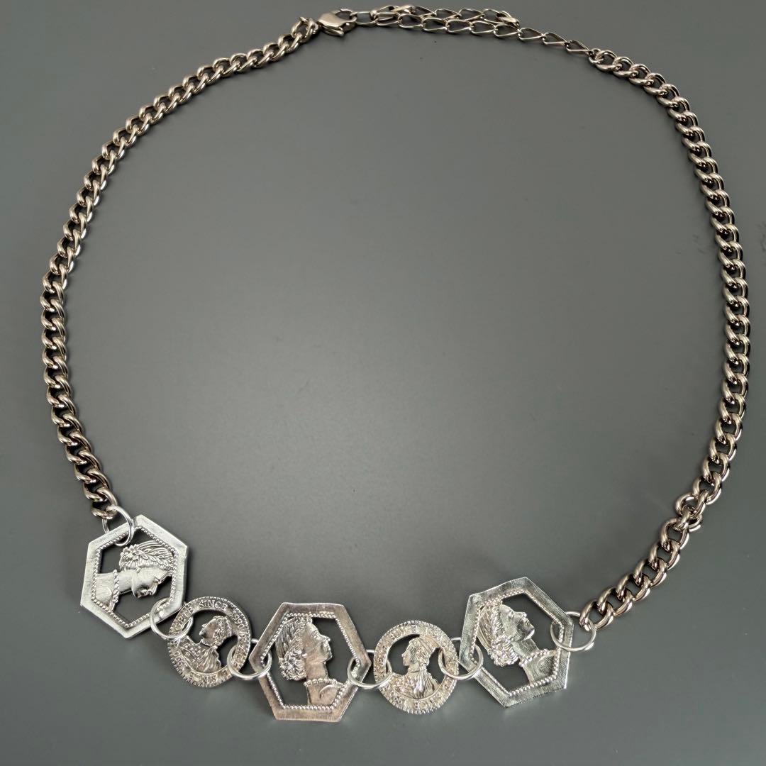 Silver plated Agat Coin Motif Necklace with a 49.5 cm length displayed on a white background