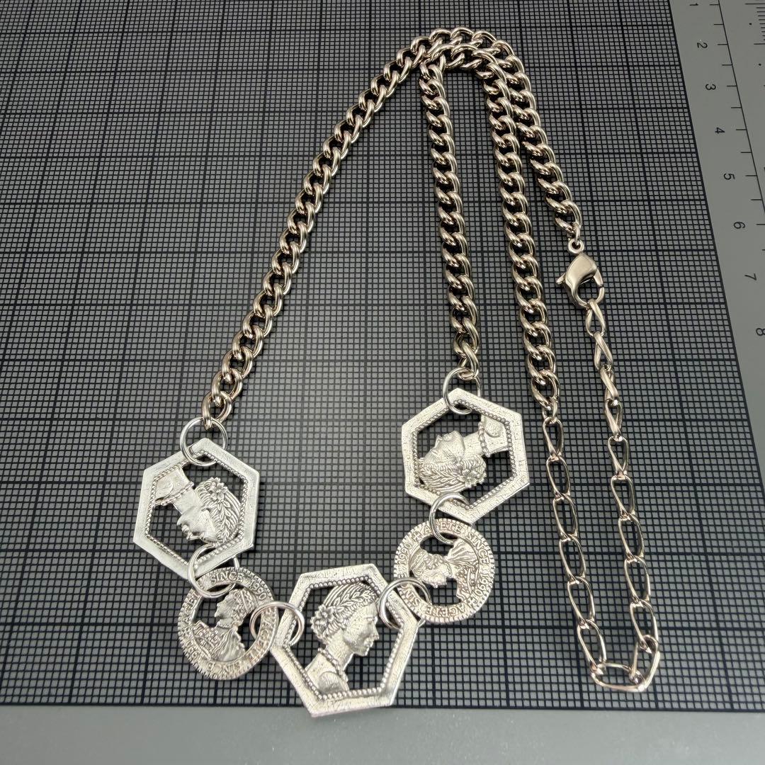 Silver plated Agat Coin Motif Necklace with a 49.5 cm length displayed on a white background