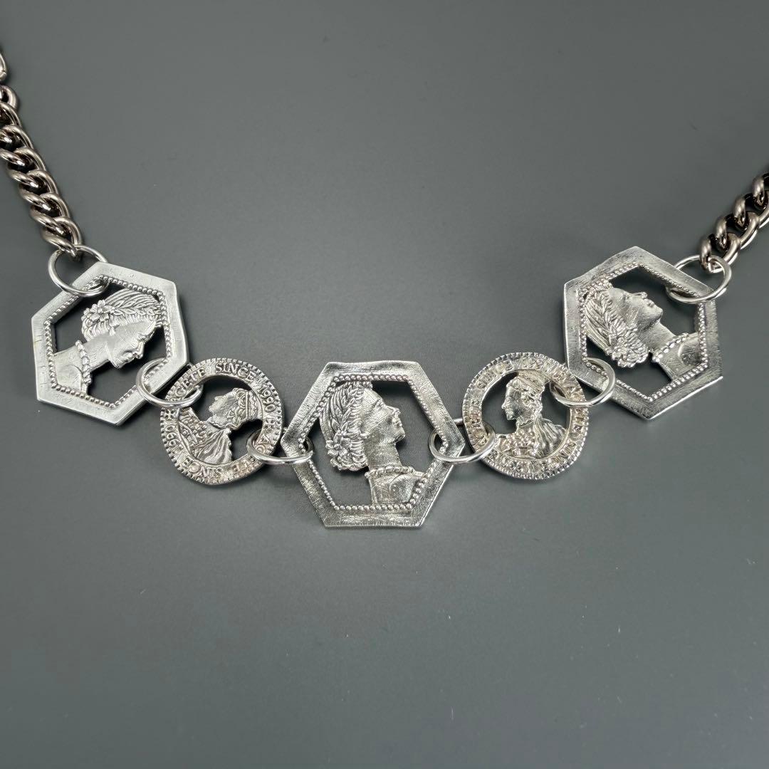 Silver plated Agat Coin Motif Necklace with a 49.5 cm length displayed on a white background