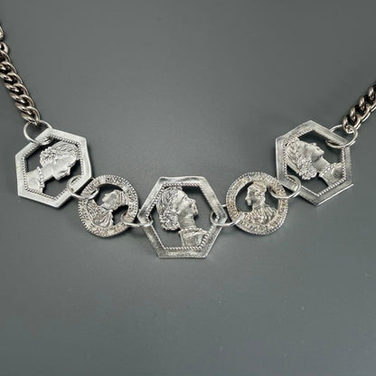 Silver plated Agat Coin Motif Necklace with a 49.5 cm length displayed on a white background