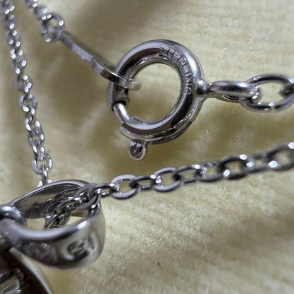 Mikimoto heart-shaped pearl pendant necklace featuring five pearls with silver decoration and included box