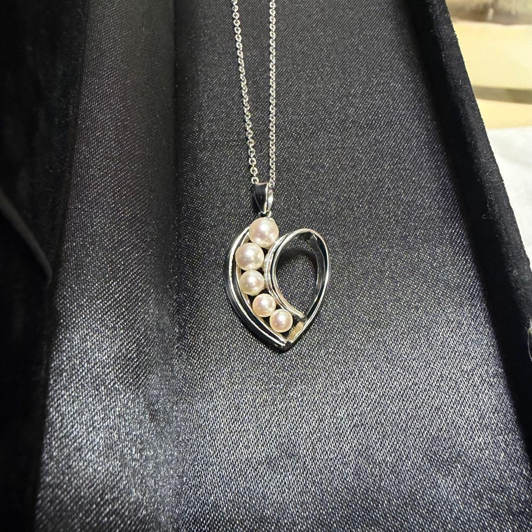 Mikimoto heart-shaped pearl pendant necklace featuring five pearls with silver decoration and included box