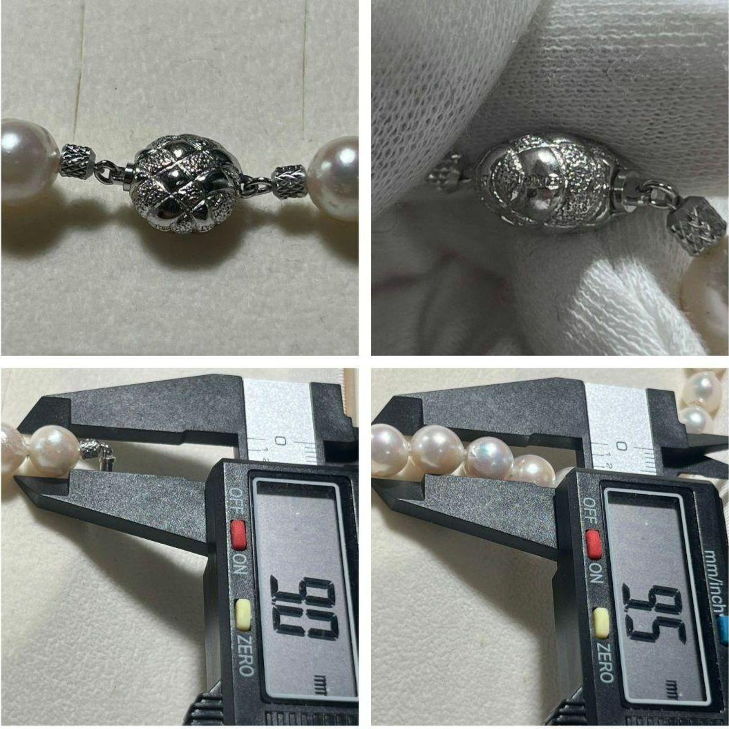 Akoya pearl necklace with 9.0-9.5mm white semi-round pearls and silver engraved round clasp, 42cm length