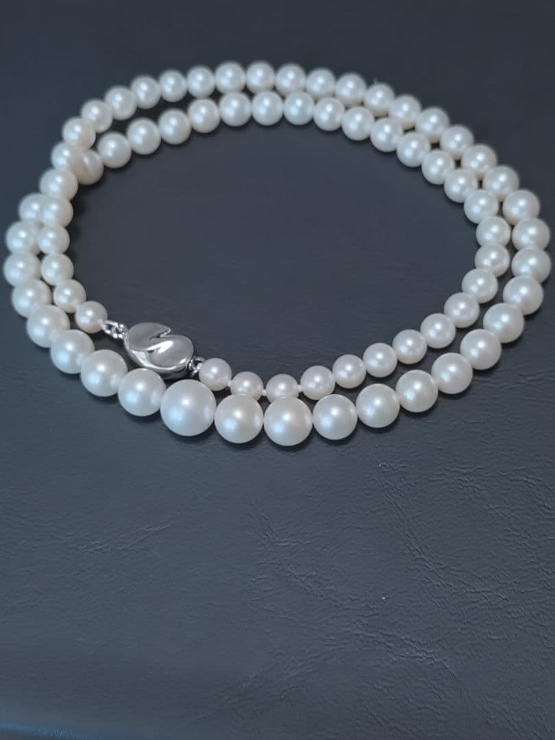 Akoya genuine pearl necklace with white pearls and silver clasp single strand design