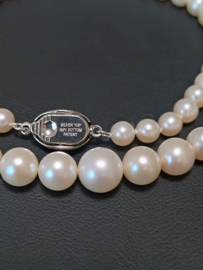 Akoya genuine pearl necklace with white pearls and silver clasp single strand design